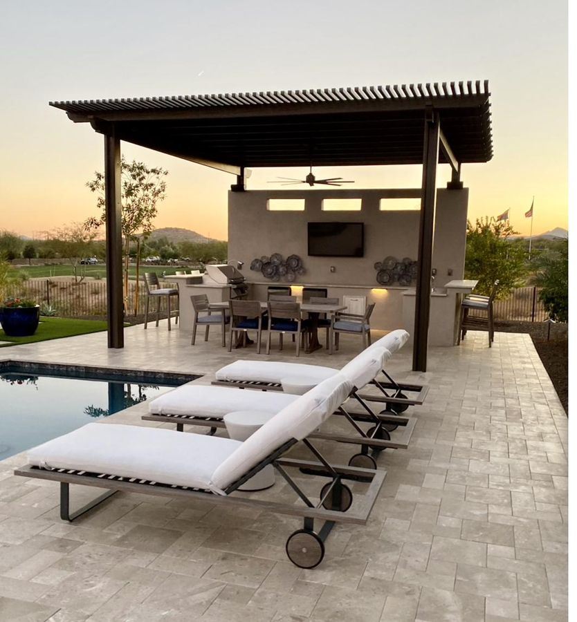Sunset patio with pergola, outdoor kitchen and restored chaise cushions